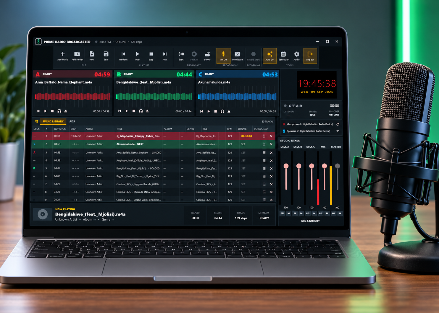 Prime Radio Broadcaster for Windows showing the music decks, library and studio mixer on a laptop